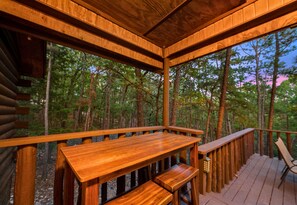 A rustic outdoor bar setup that's just right for enjoying a refreshing drink or two in the great outdoors.