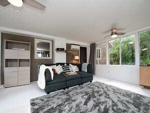 Sunroom also boasts mini split and fans, making it an ideal space in all seasons