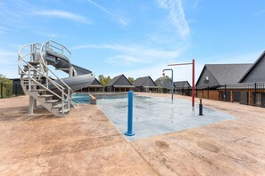 The Rocky Shores pool offers a fun slide, splash pad, and plenty of swimming area for the entire family. 