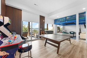 Game on! Enjoy arcades, ping pong, and a netted play area in this ultimate fun zone.