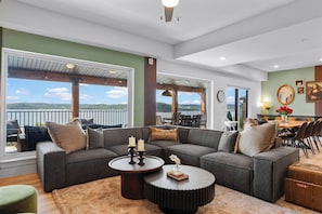 Get cozy and enjoy incredible lake views in the living and dining area