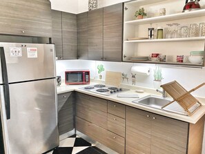 Fully Equipped Kitchen. Stovetop, oven, refrigerator, coffee maker, microwave, +