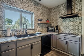 It doesn't matter if you're cooking together or sharing stories over coffee, this kitchen is made for connection.