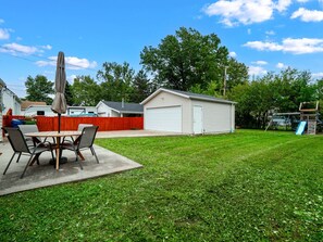 Enjoy peace and quiet in a secluded backyard with playset!