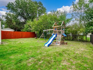 Enjoy the fenced-in backyard—perfect for kids, pets, or a relaxing afternoon.