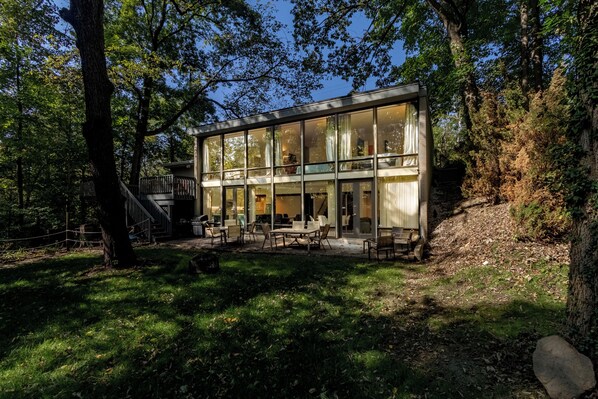 private backyard with creek / ample seating / propane grill