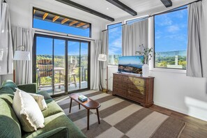 This cozy and quaint living room is the perfect space to unwind with your loved one after a long day of adventure!