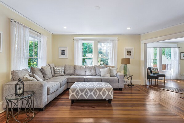 Bright, spacious, and welcoming living room.