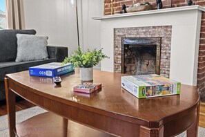 Living Room: Where modern comfort meets curated style—unwind in the heart of it all.