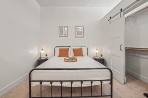 You’ll feel enveloped in warmth in this charming room with its rich wood accents and inviting bed. Wake up refreshed, surrounded by rustic coziness, and enjoy the perfect mix of comfort and natural vibes