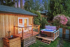All season hot tub has lake views.