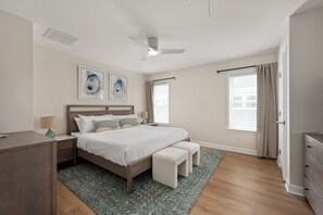 Primary bedroom with king bed and en suite bath