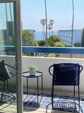 Right off the living room is the ocean view deck, perfect for relaxing outdoors 
