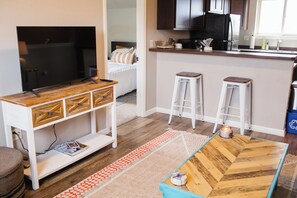 Spacious living room with a Smart TV