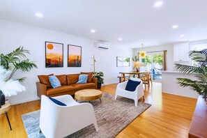 Welcome home! Our open-concept living room is designed for comfort & relaxation.