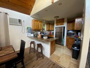 Full kitchen and Dinning room w/breakfast bar