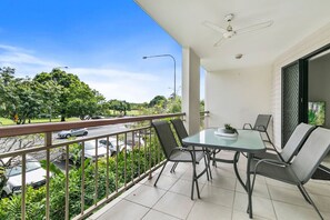 Private balcony with dining table, 6 chairs and ceiling fan to enjoy tropic climate