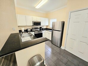 Kitchen with New Stainless Steel Appliances