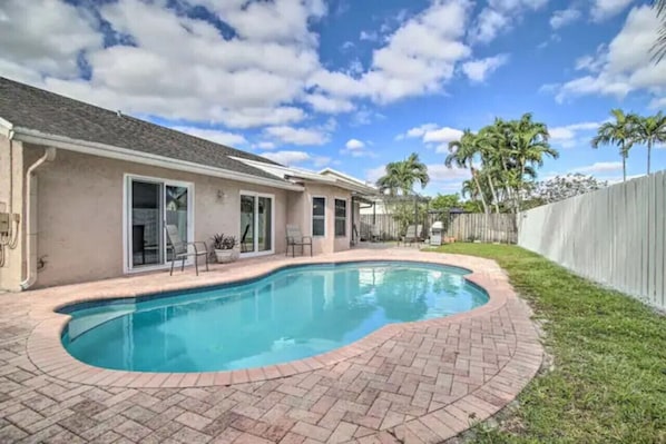 Scenic poolside view offering a relaxing retreat right outside your door.
