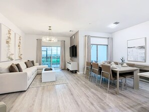 Cozy up in the spacious living area, perfect for unwinding with loved ones.