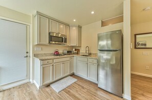 Kitchen area with double burners, refrig, microwave, Breville Smart oven/Toaster