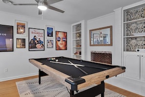 Billiards in the movie theater / game room