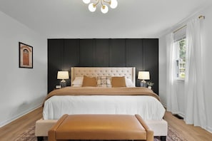 Master's bedroom with king bed and plush beddings