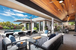 Enjoy your morning coffee or afternoon beverage on the outdoor sofa.