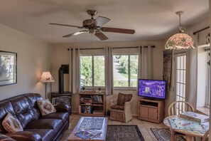 Cozy family room with wood stove to heat the whole unit!
