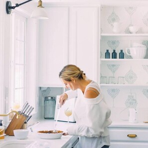 Baking in the bright kitchen is always a joy.  You can see the Jura espresso machine tucked in the corner for that perfect morning delight with beans we ship in from one if our favorite areas in Ticino, Switzerland.