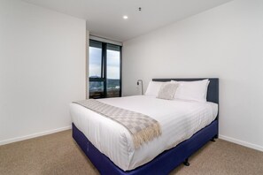 Enjoy the comfort of a queen-size bed with professionally laundered linens, ensuring a fresh and luxurious sleeping experience.