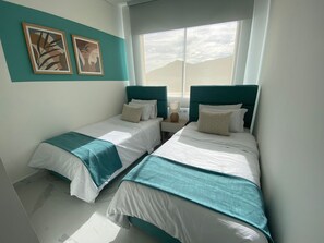 Two twin bedrooms, air conditioning, mountain all with a tranquil modern design