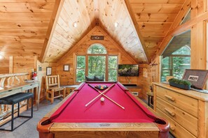 Upstairs loft with TV, workspace, pool table