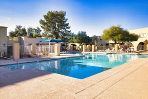 Large pool steps from the unit to cool off from the Arizona heat