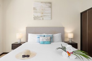 This inviting bedroom features a plush mattress, ensuring a restful night’s sleep. The bed is dressed with clean, high-quality linens and soft pillows for maximum comfort.