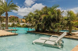 Dive into this inviting outdoor pool, perfect for cooling off on a sunny day or enjoying a leisurely swim.