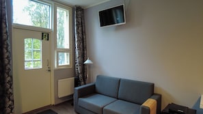 Couch and terrace entrance
