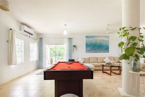 Living room with pool table