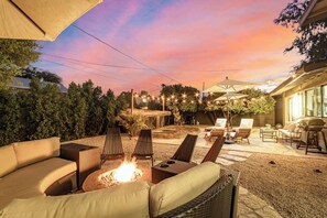 Backyard Firepit Lounge with Plenty of Seating