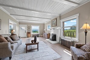 Our large Living room with wooded and beam ceiling feature.