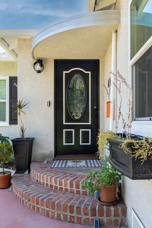 Private, lighted entry for guests up two steps