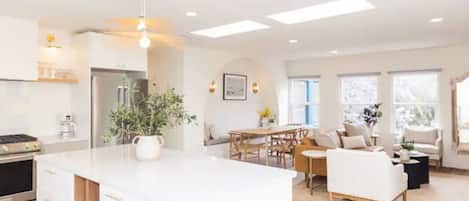Open kitchen, dining room and living room