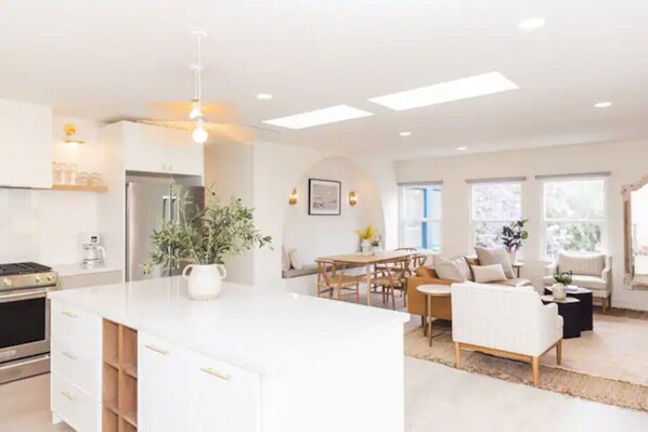 Open kitchen, dining room and living room