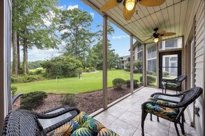 Serene porch,  enjoy mornings with coffee and afternoon sunsets over the lake.