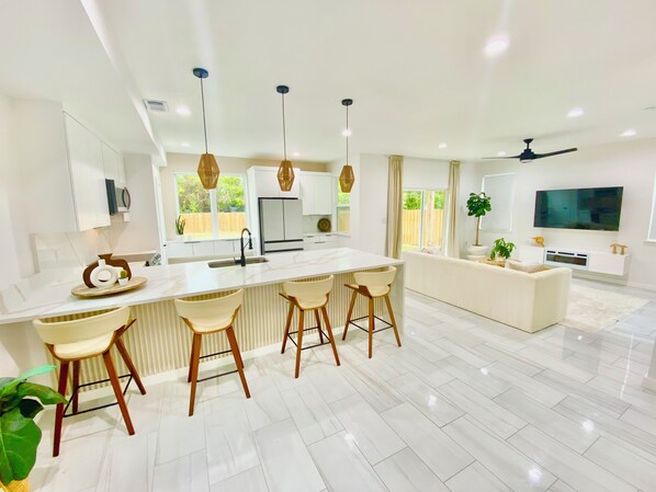 Kitchen and living room area spacious and clean 