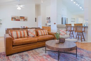 Open concept living room with dining room and kitchen