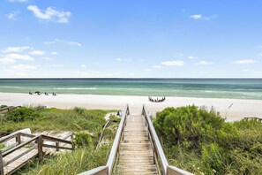 Private beach access is just across the street from the home!