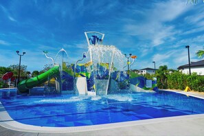 Get ready to splash and slide in this vibrant water playground, designed for maximum fun and excitement.