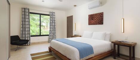Upstairs master bedroom overlooking the pool & trees where monkeys love to play