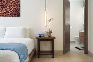 Pendant lights are just one of the many ovely details in upstairs master bedroom